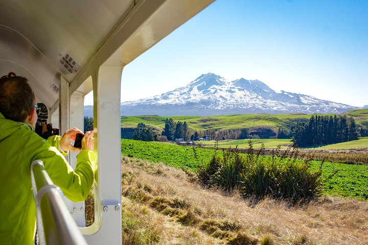 Journey through New Zealand's remarkable landscapes from the rugged peaks of the Central Plateau to lush farmlands all while enjoying the comfort of the Northern Explorer train.
